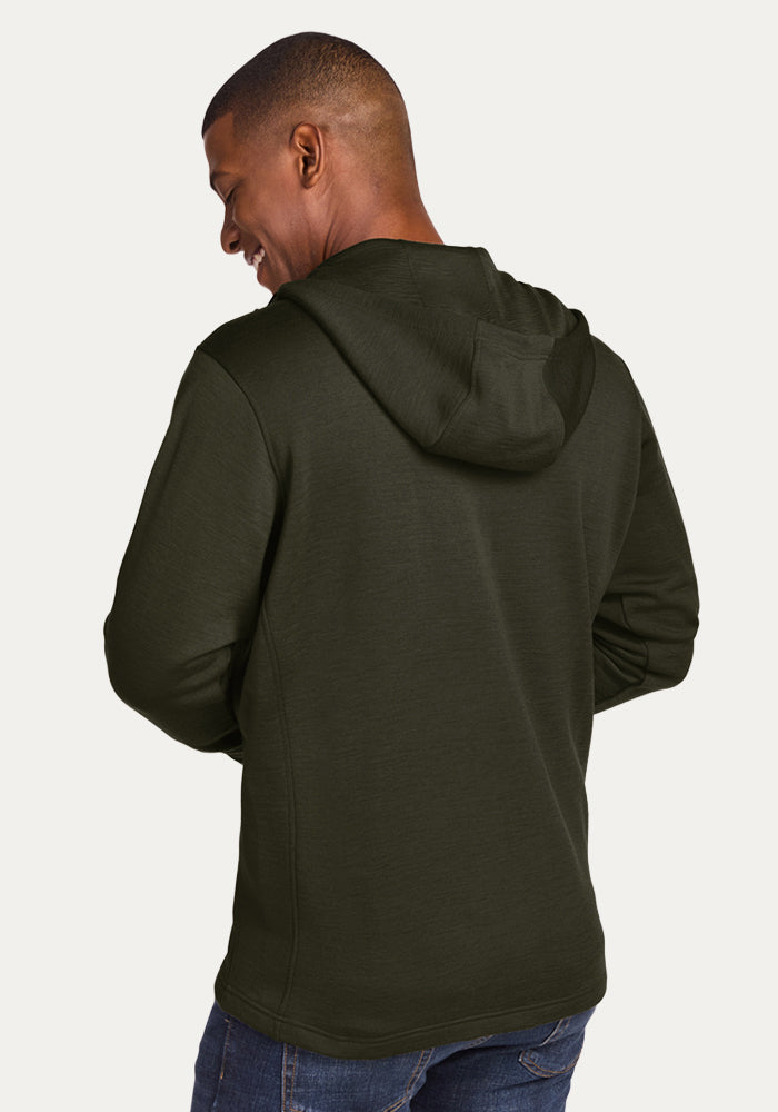 Back view of a man wearing a dark green, moisture-wicking Grizzly Sweatshirt - Duffel Bag.