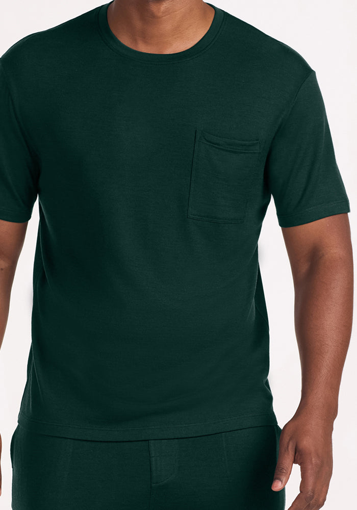 Woolx Finn Top - Deep Pine dark green moisture-managing lounge shirt with a crew neck and chest pocket.