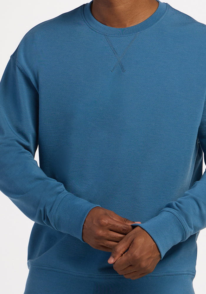 Blue Ashes Miles Crewneck sweatshirt with a ribbed collar and V-shaped stitching detail.