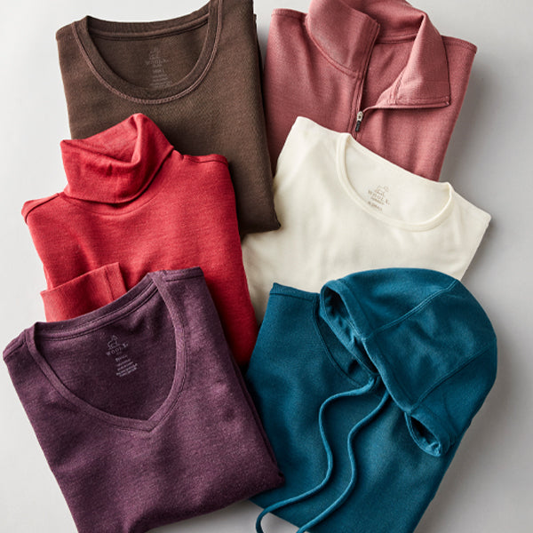 Flatlay image of fall essentials in womens tops
