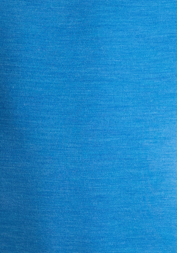 Close-up view of the Woolx Kids Explorer Base Layer Top in Blue Razz, made from soft Australian Merino wool with a textured surface—ideal as a thermal top for kids.