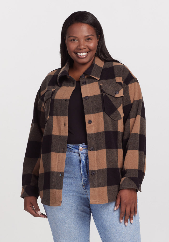 Model wearing Sawyer Shacket - Camel Checkered | Le’Quita is 5’11”, wearing a size XL