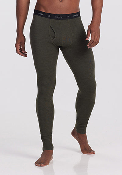 Model wearing Backcountry leggings - Dark Moss | Trell is 6’2”, wearing a size M
