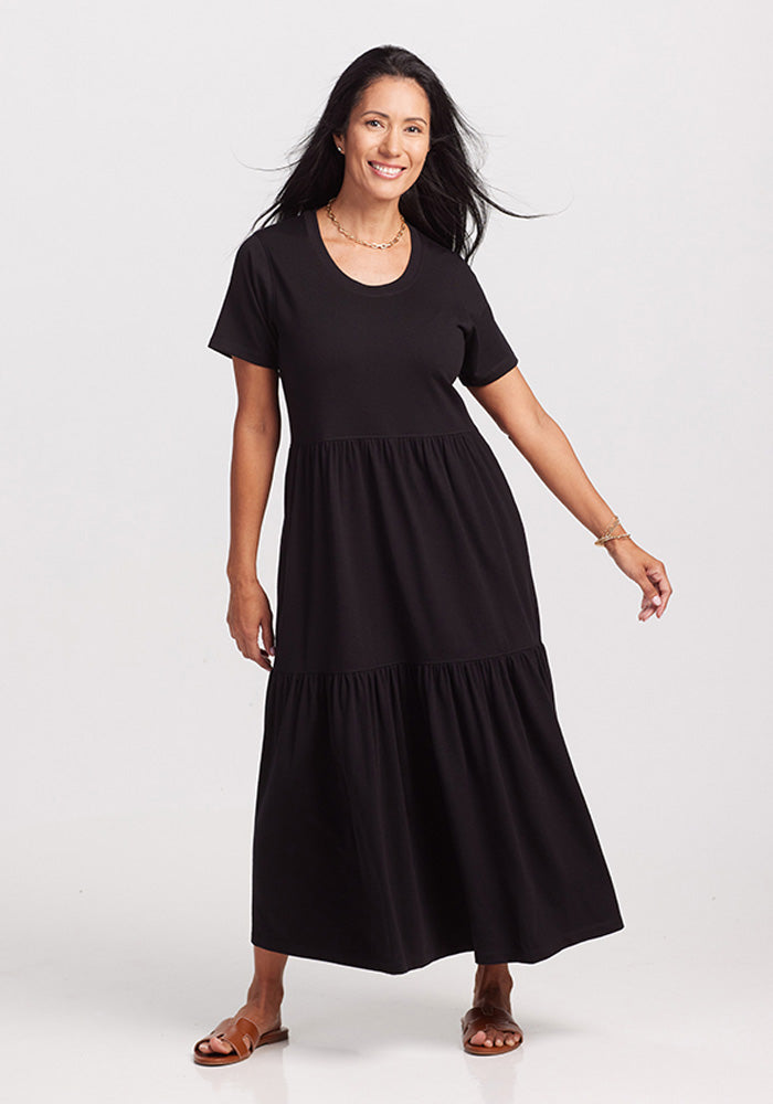 Model wearing Lucia Dress - Black | Denia is 5'8", wearing a size S
