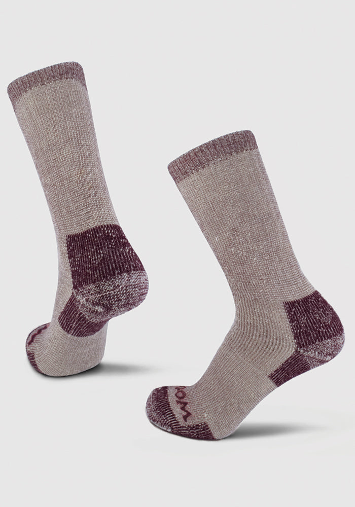 Two light gray Woolx Womens Extreme Crew Socks in Windsor Wine, featuring maroon heels, toes, and cuffs, stand upright to show both front and back views—ideal for cold weather and cozy style.