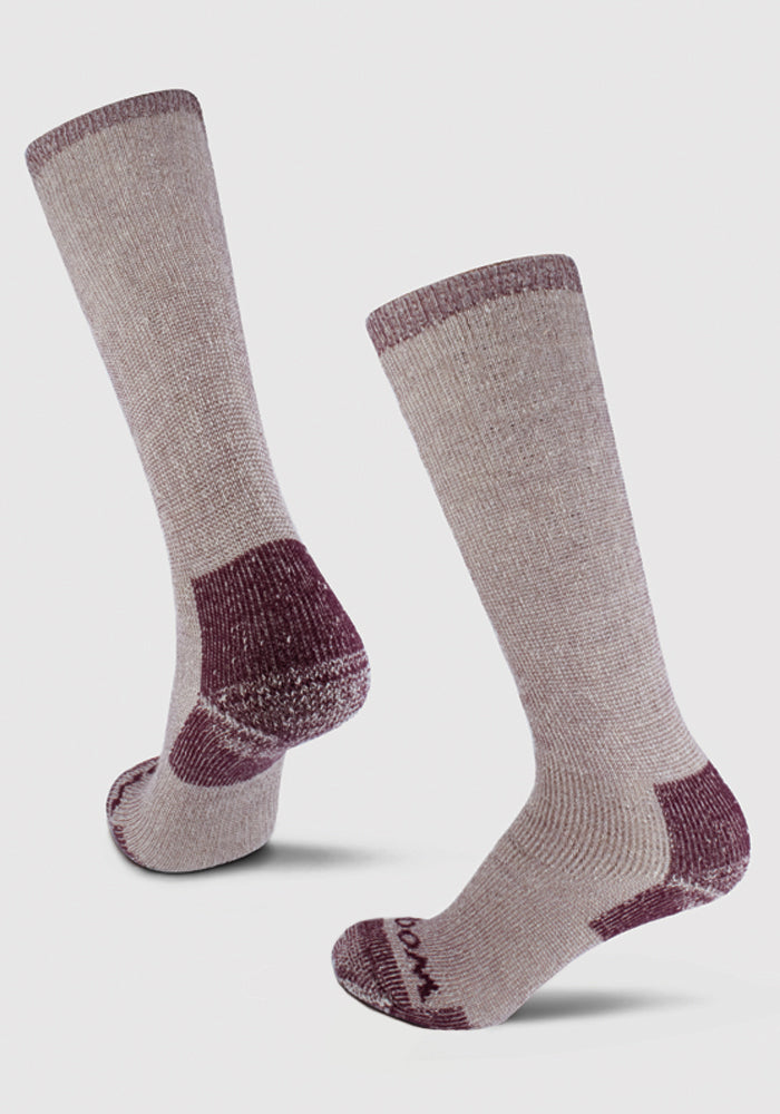 Woolx Womens Extreme Over The Calf Socks in Windsor Wine feature heavyweight merino wool in light gray with maroon accents. Shown against a white background, these warm winter socks are perfect for chilly days.