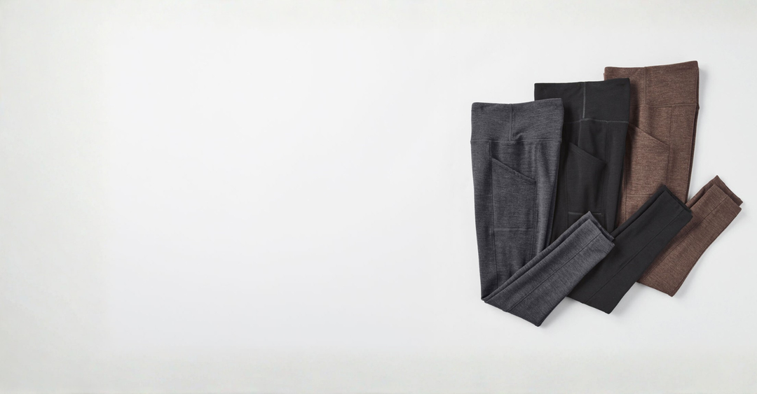 Leggings laid out in grey black and brown against a white background. 