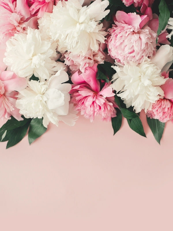Pink background with flower bouquet on top mobile size