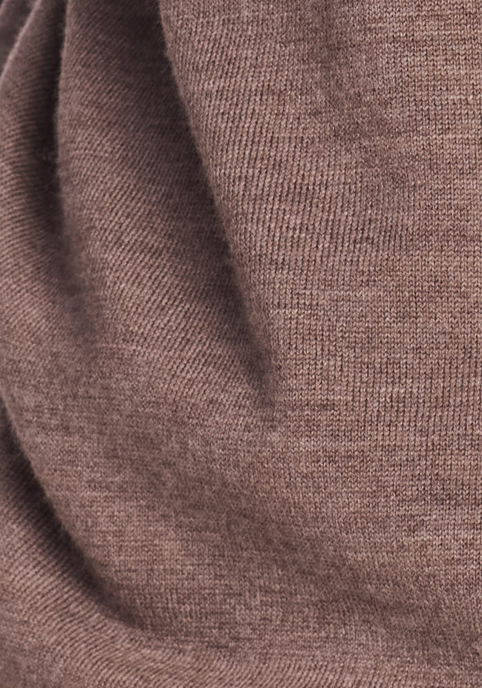 Close-up of the Woolx Chessy Tank Top in Simply Taupe, featuring a soft, fine ribbed texture and gentle folds—perfect as a cozy layering piece or classic sleeveless sweater.