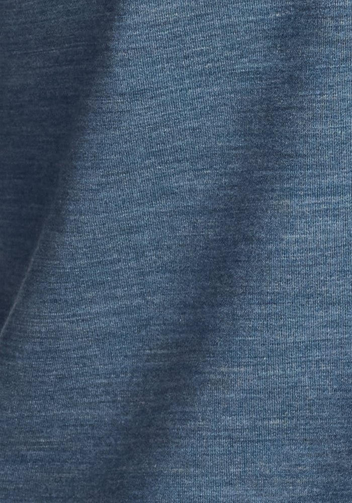 Close-up of the Woolx Jackson Henley in Steel Blue, highlighting the soft merino wool texture and subtle color variation—ideal for an odor-resistant, naturally moisture-wicking shirt.