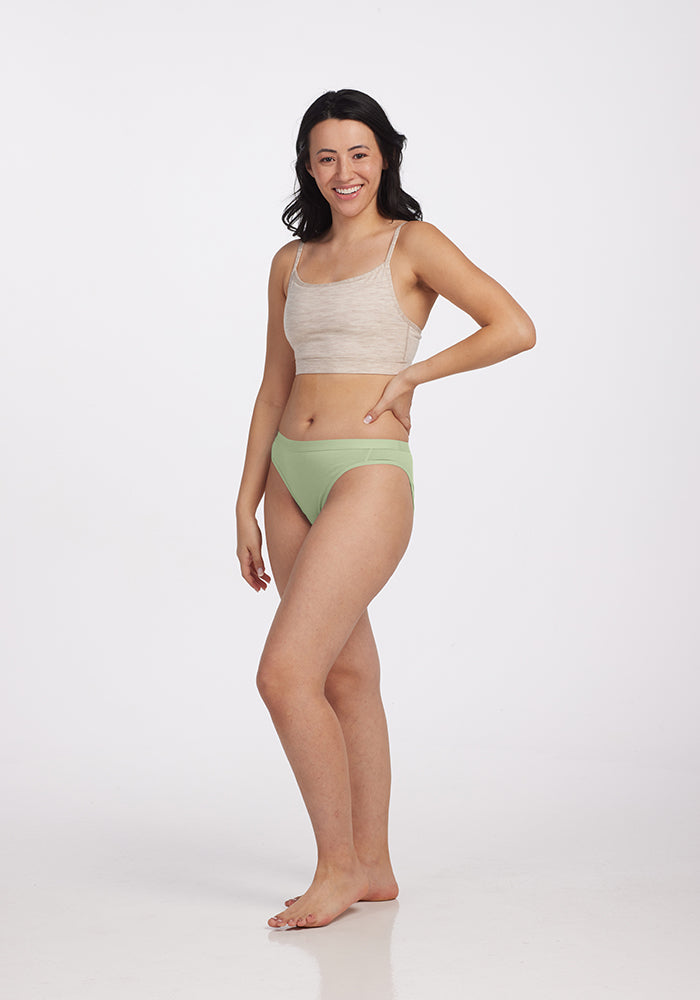 Model wearing Roxie bikini - Quiet Green