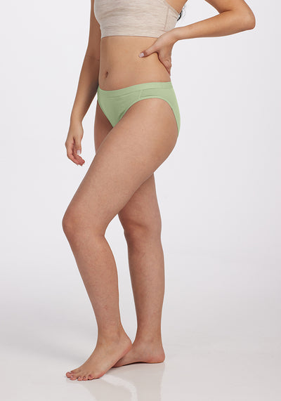Model wearing Roxie bikini - Quiet Green