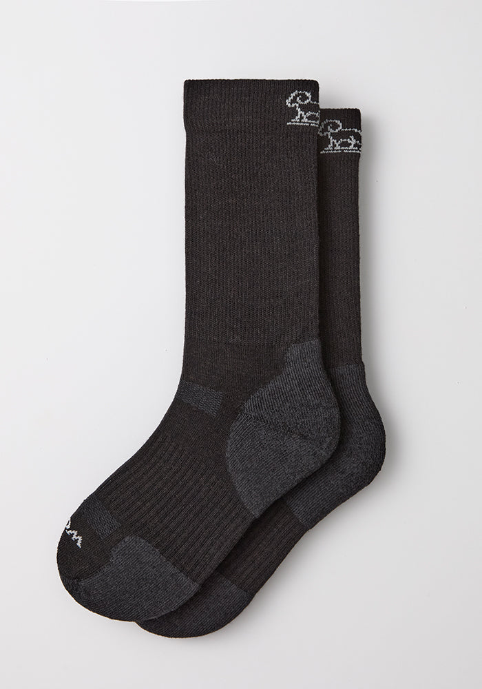 Woolx Mens Harbor Crew Sock in black, Merino wool, crew length with subtle white logo near the top.