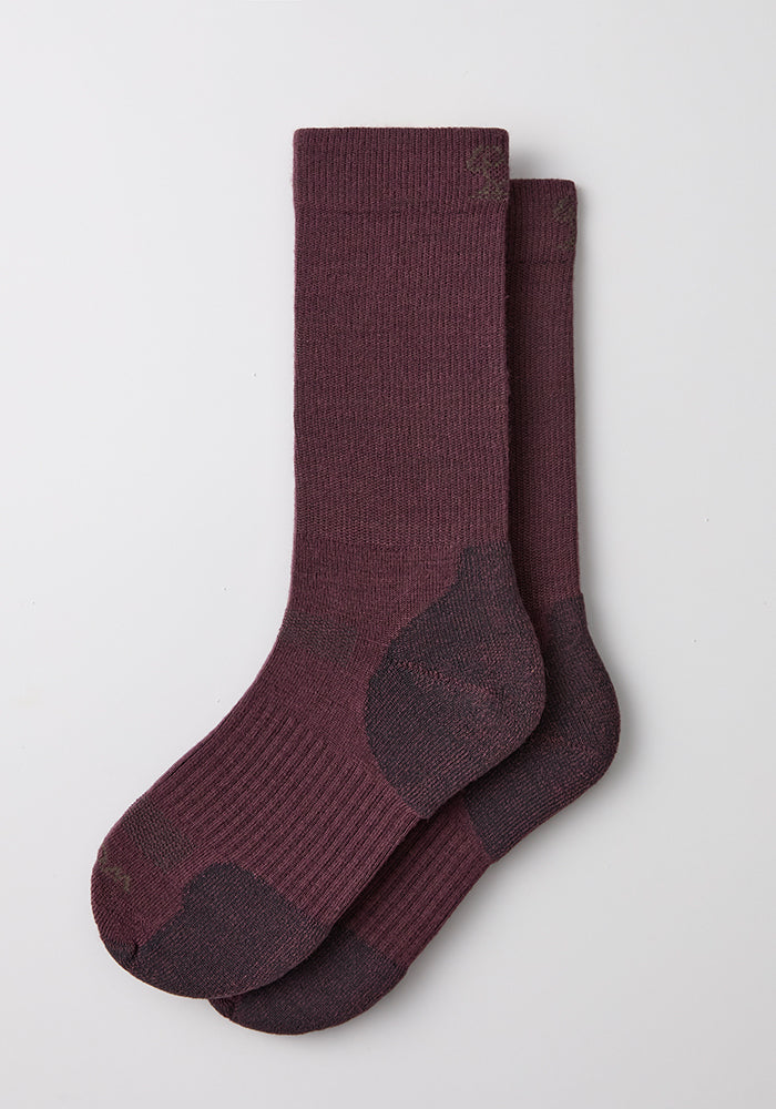 A pair of Woolx Womens Harbor Crew Socks in Grape Harvest, with darker heels and toes, laid flat on a white background.