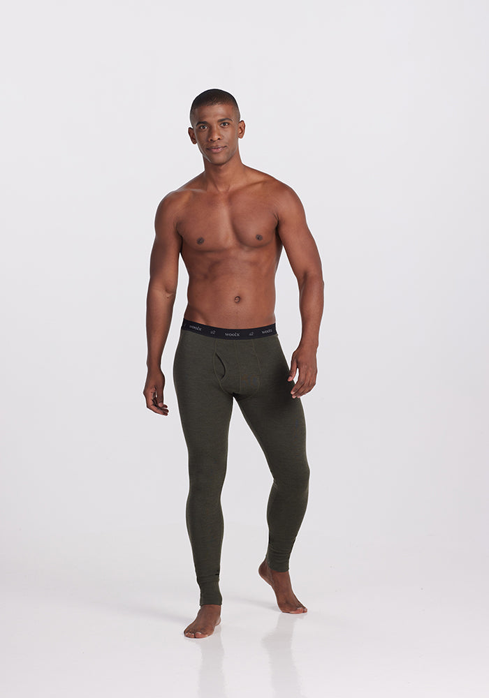 Model wearing Backcountry leggings - Dark Moss