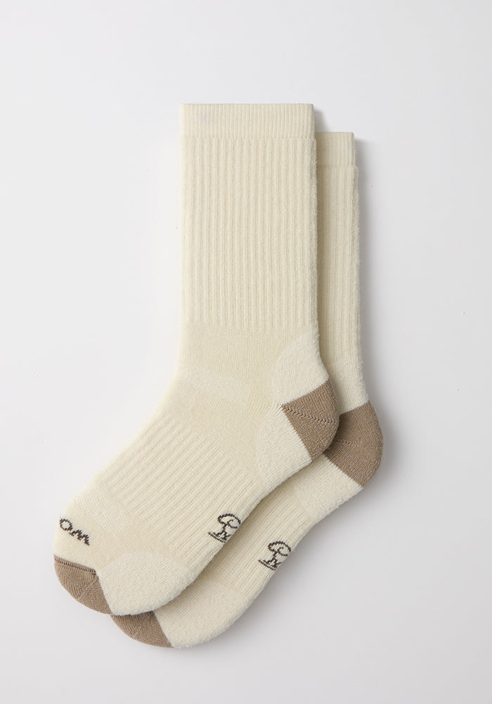 Two Woolx Womens Core Crew Socks - Natural, cream with beige heels and toes, stacked on a white background.