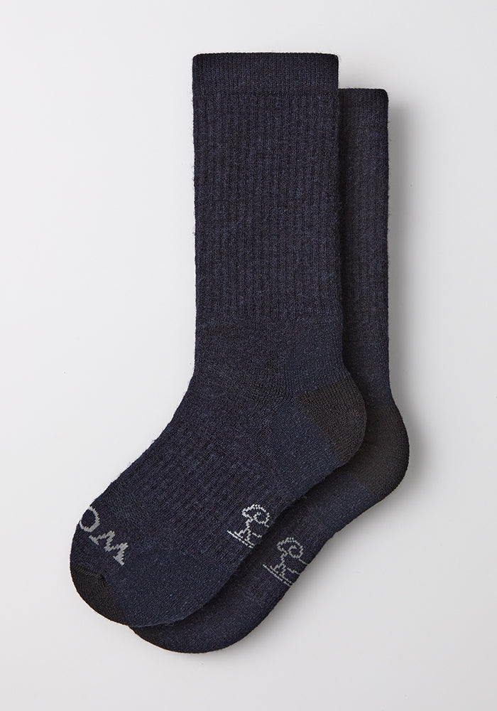 Woolx Mens Core Crew Sock in navy, ribbed, moisture-wicking, with white toe lettering—ideal for hiking.