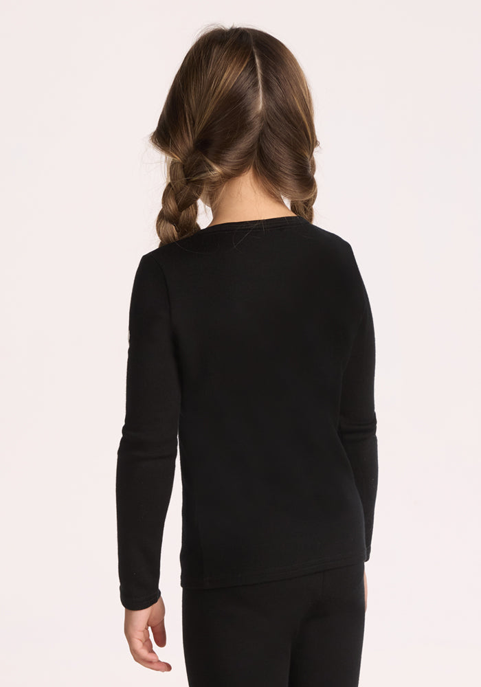 A young child with brown braided hair faces away from the camera, wearing the Woolx Kids Explorer Base Layer Top in black with matching pants, set against a light background.