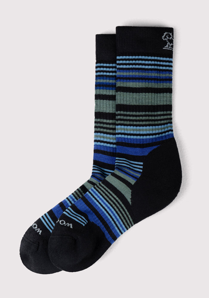 Woolx Mens Everyday Crew Socks in Black Stripe feature horizontal blue, green, and gray stripes, reinforced toe and heel, moisture-wicking comfort, and a small white logo near the top.