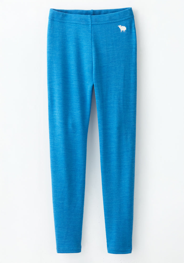 The Woolx Kids Explorer Base Layer Bottoms in Blue Razz are slim-fit merino wool leggings with an elastic waistband and a white moose logo on the left hip, shown laid flat on a white background.