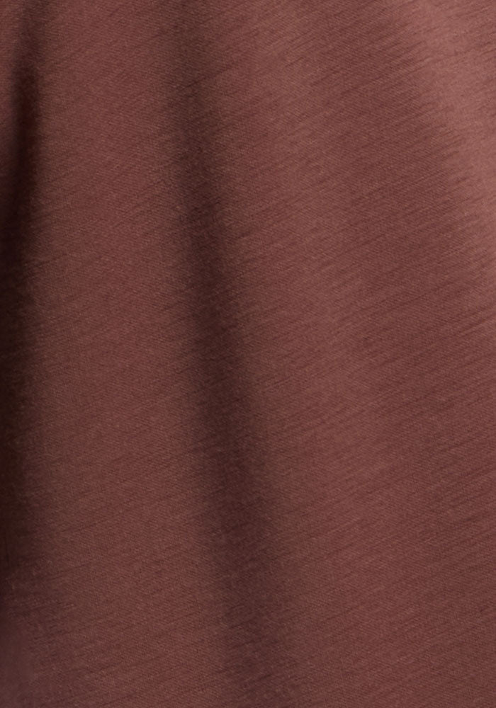 The Woolx Mason 1/4 Zip - Canyon Clay features smooth Merino wool fleece with subtle shadows and gentle folds.