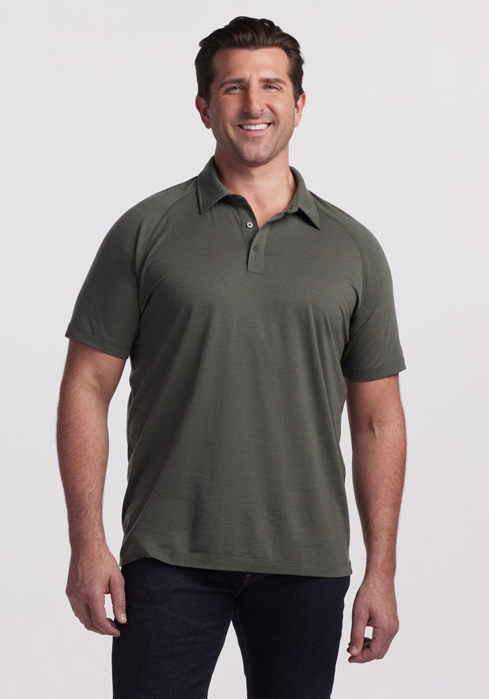 Model wearing Summit polo - Deep Fern | Brandon is 6’3.5”, wearing a size XL