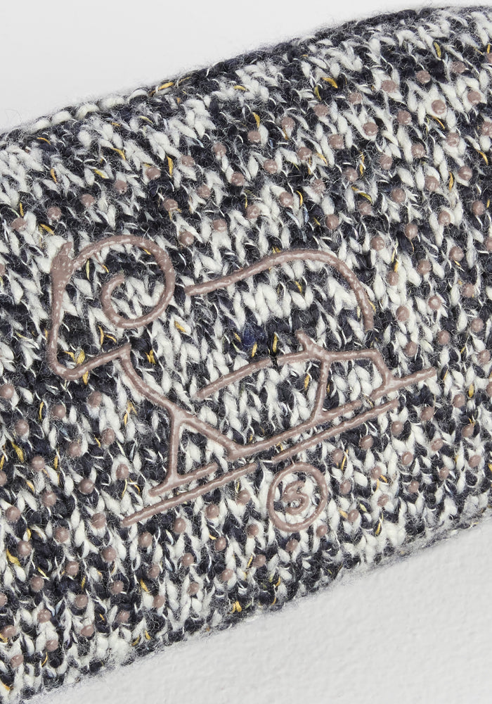 Close-up of Woolx Women’s Gripper Slipper Booties in Speckled Stone, cozy and wool-like with embroidered sheep detail.