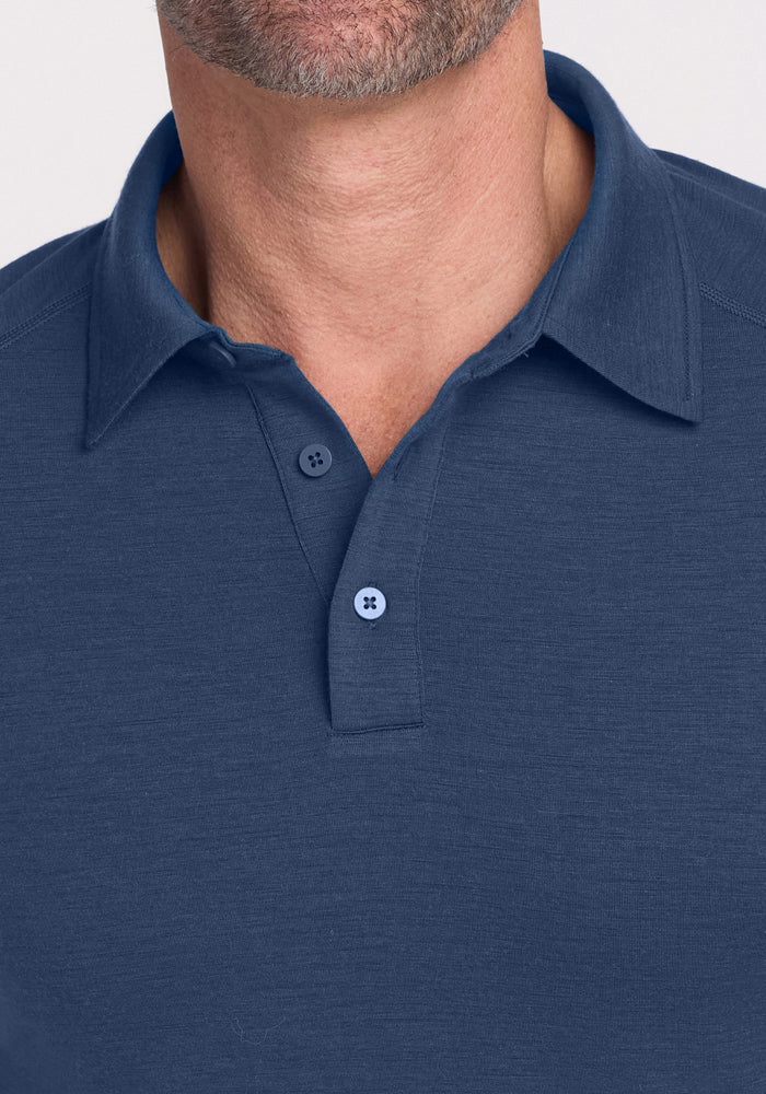 Close-up of a man's lower face and neck wearing the Woolx Summit Polo - Starry Night, showcasing its buttons, collar detail, and advanced moisture management designed for top athletic performance.