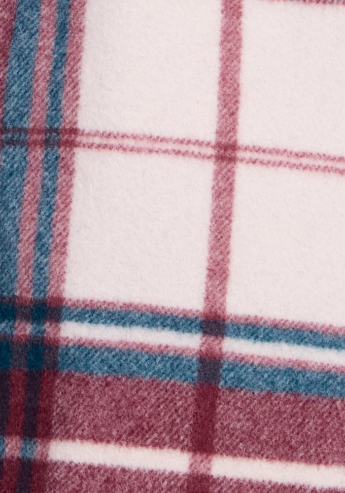Close-up of the Sutton Shacket - Frozen Cranberry Plaid by Woolx, featuring soft fabric with a fuzzy texture and classic burgundy, teal, and white plaid—ideal for a cozy, stylish look.