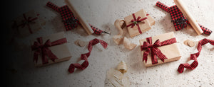Wrapped gifts on plain background