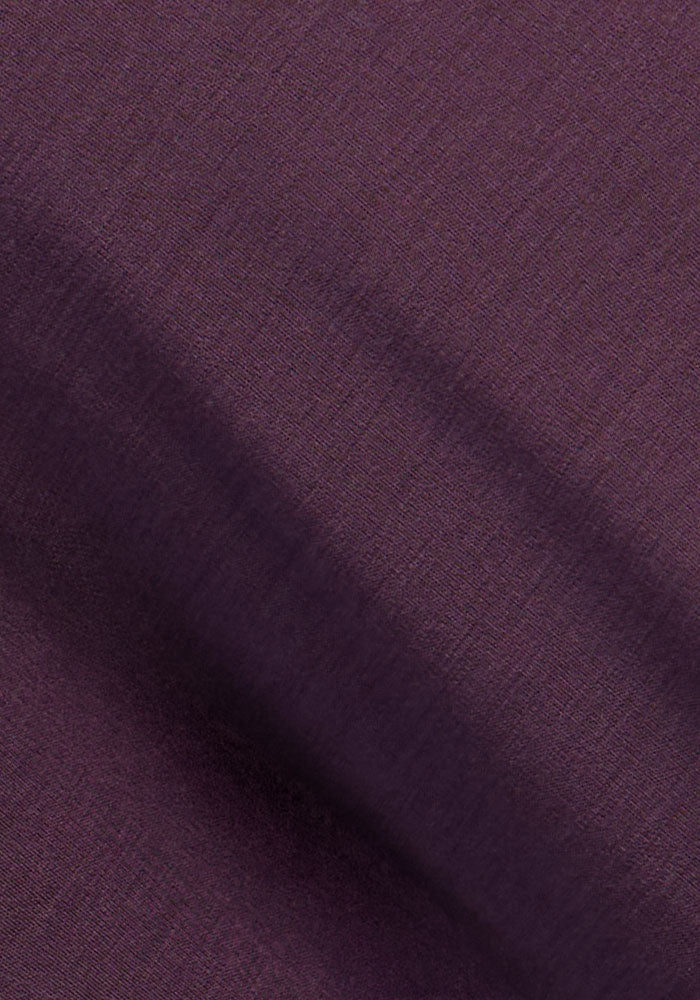 Close-up of Woolx Hannah Long Sleeve Top - Purple Iris, ultra-soft Merino wool with fine weave and diagonal shadows.