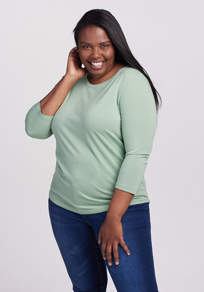 Model wearing Jenny top - Basil | Le'Quita is 5'11", wearing a size XL