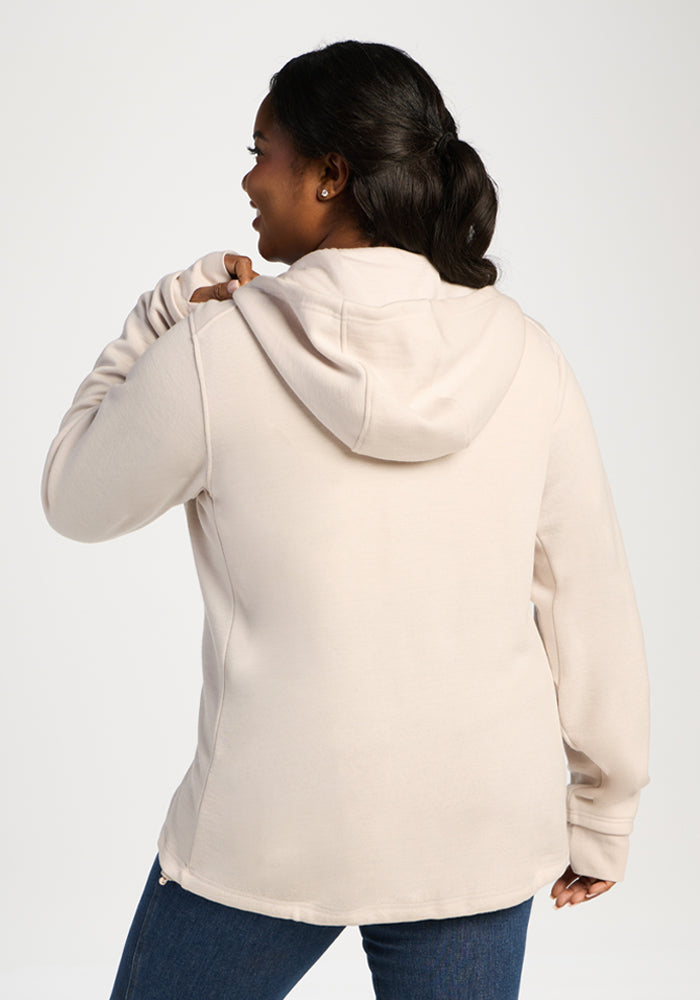 A woman seen from behind wearing an ecru Cubby Hooded Sweatshirt.