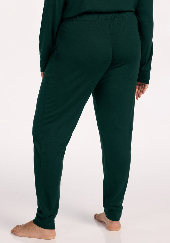 Back view of dark green Mary Kate Lounge Pants - Deep Pine, featuring an elastic waistband and cuffed hems.