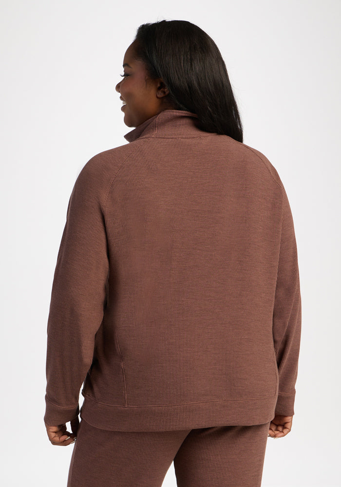 Person in Woolx Quinn Ribbed 1/4 Zip - Sable Heather, back to camera, on white background.