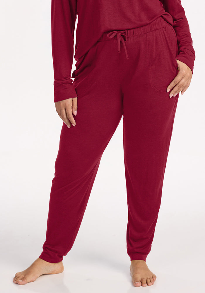 Beet Red Woolx Mary Kate Lounge Pants with a drawstring elastic waist, pockets, and moisture-wicking fabric. 