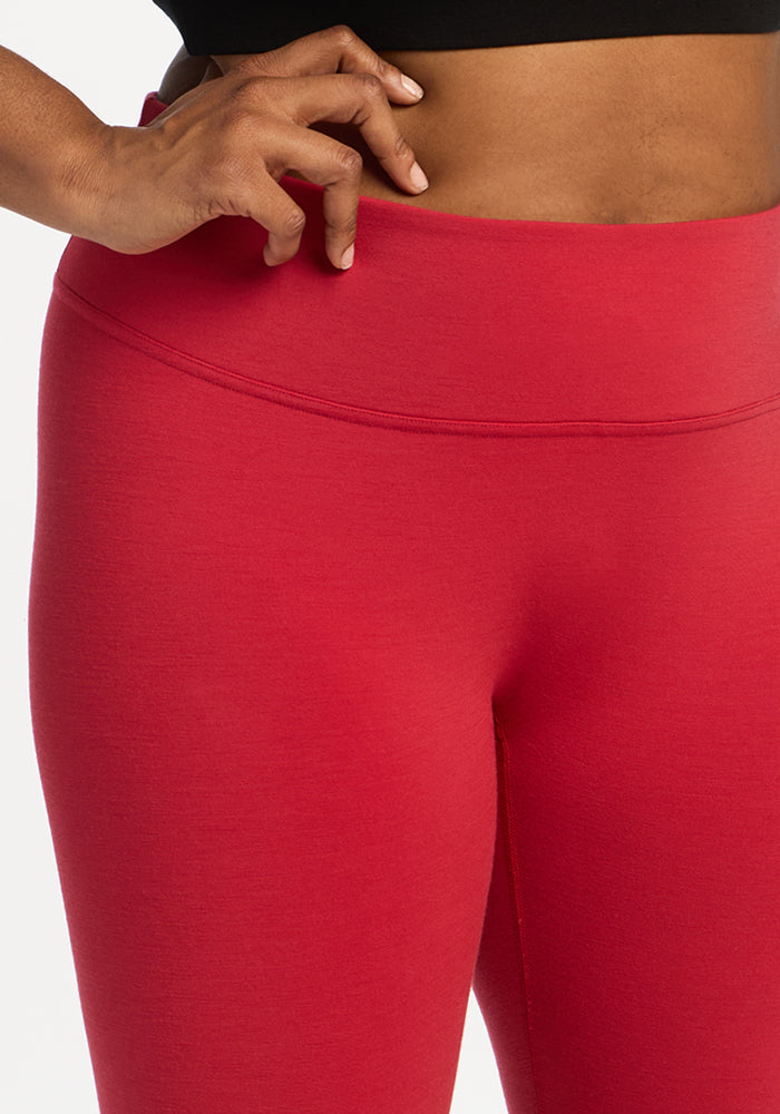 Close-up of bright red Angela Leggings - Maraschino Cherry high-waisted leggings.