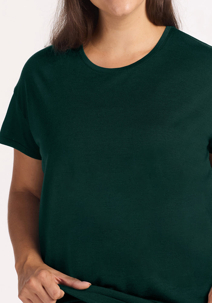 Woolx Billie Lounge Tee - Deep Pine, a moisture-wicking dark green short-sleeved crew neck t-shirt.