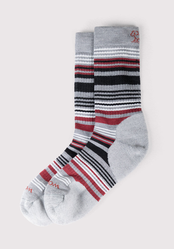 Woolx Womens Everyday Crew Socks in light grey stripe feature black, white, red, and grey horizontal stripes, reinforced heels and toes, odor resistance, and display the brand logo near the top and toes.