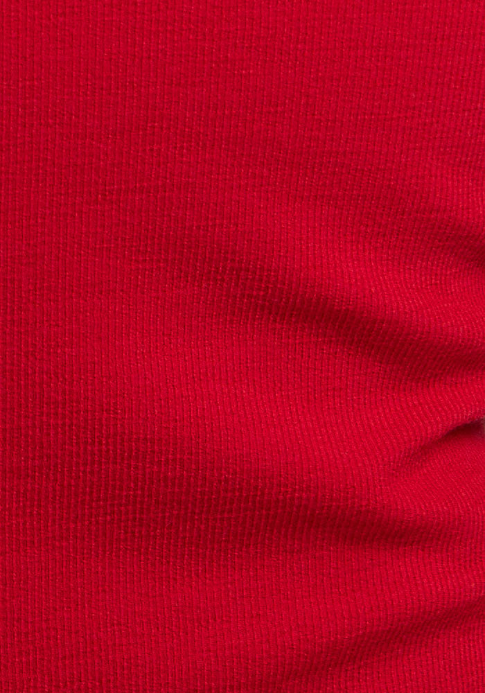 Close-up of Woolx Katie Ribbed Long Sleeve in Maraschino Cherry, showing ultra-soft merino wool and rich texture.