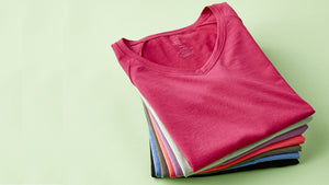 Stack of Woolx Mia Tees in assorted colors