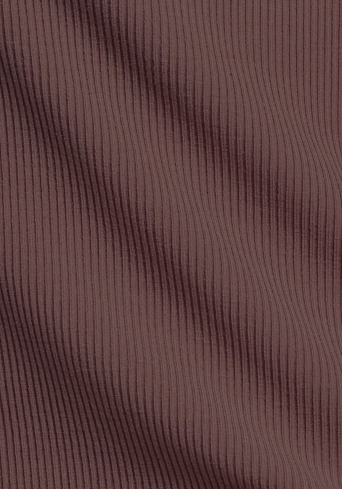 Close-up of the Woolx Vera Ribbed Tunic in Peppercorn, showing brown merino wool with vertical ribbed texture.