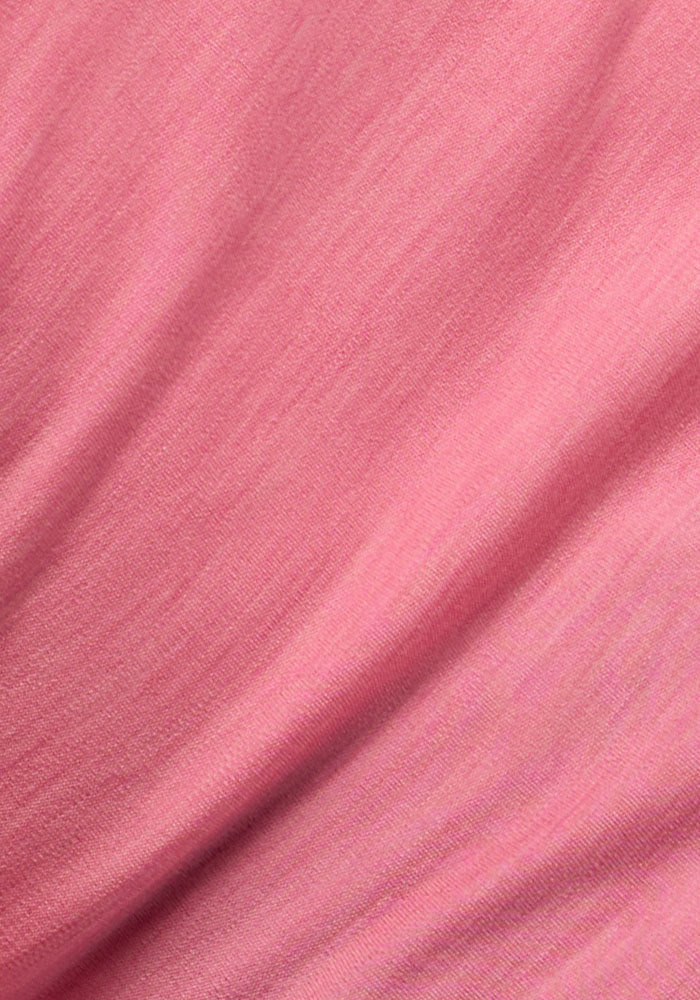 Close-up of Woolx Hannah Long Sleeve Top - Pinky Promise, showing soft, moisture-wicking merino wool with gentle folds.