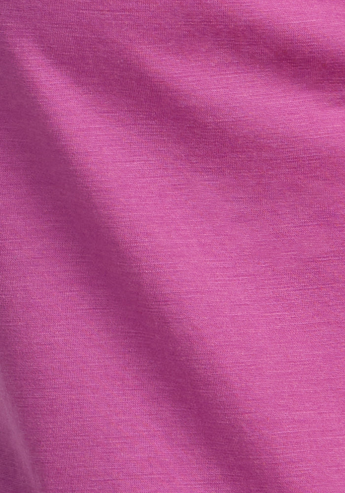 A close-up of the Liza Crew Neck Tee in Purple Wine by Woolx reveals its soft, finely textured Australian merino wool—perfect for a lightweight, premium tee.