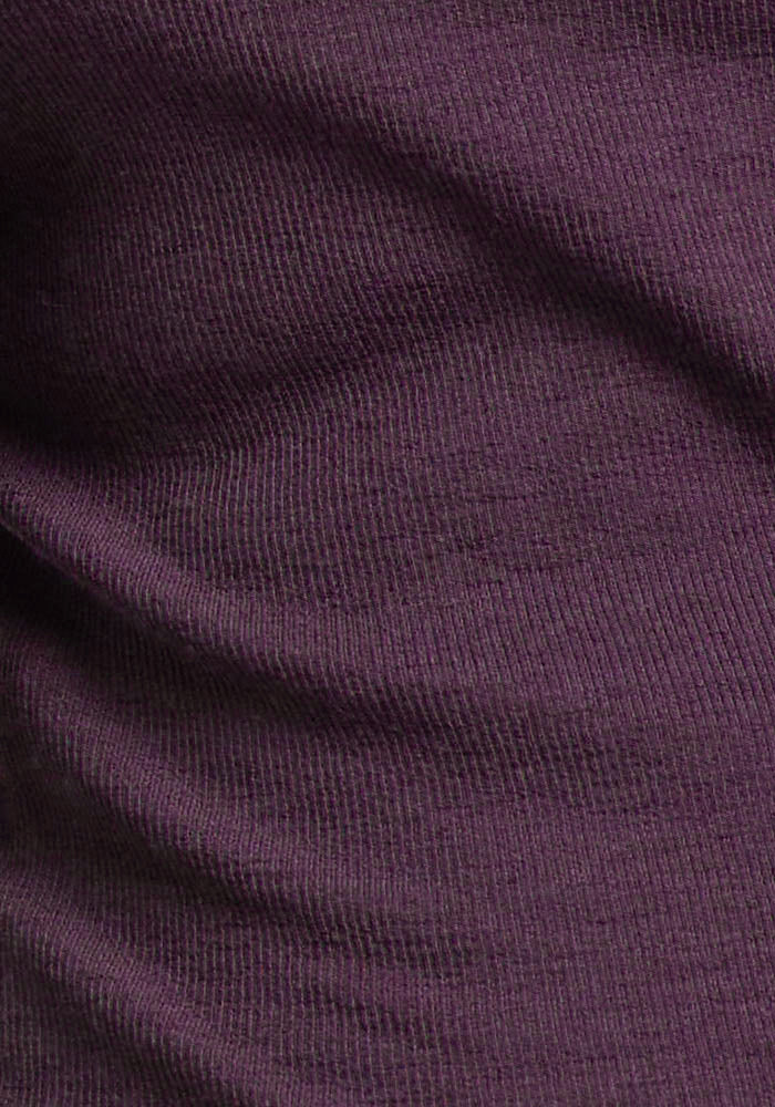 Close-up of Woolx Sage Ribbed Turtleneck in Purple Iris, highlighting texture—ideal for layering.