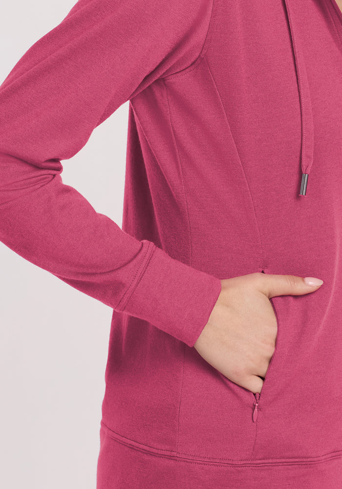 Person in a Woolx Ryann Hoodie - Mulberry, right hand in pocket, shown from the side.