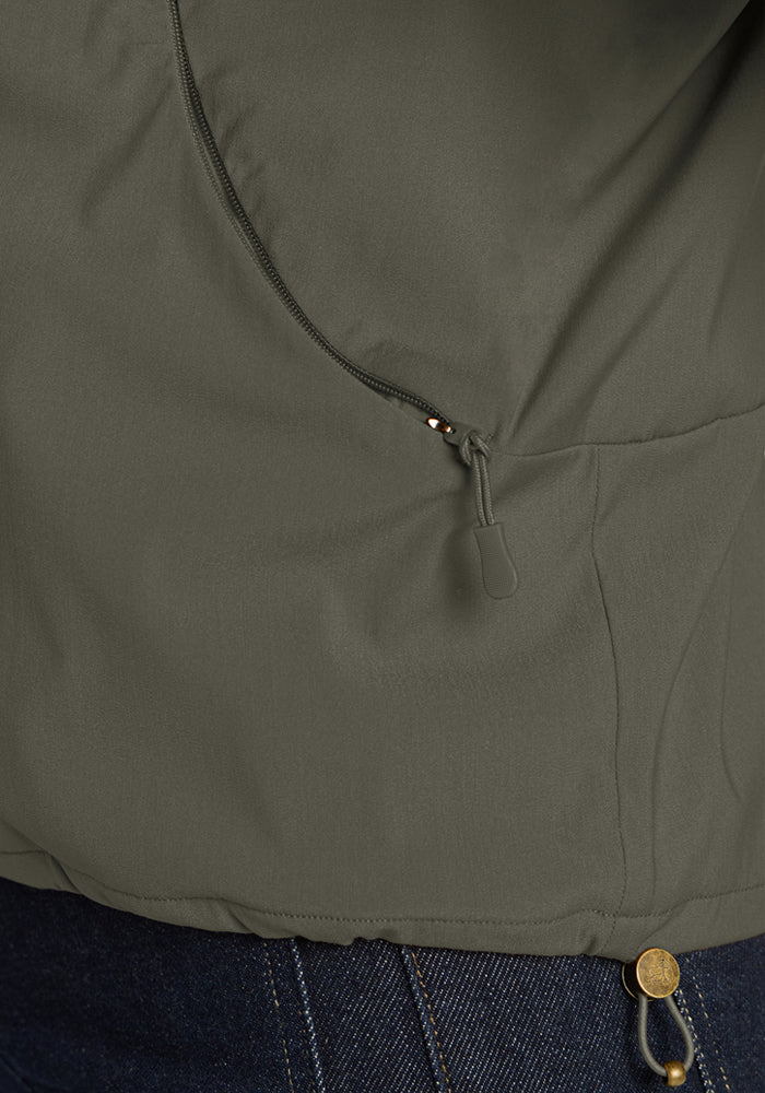 Sage Olive Cooper Windbreaker in olive green with a curved zippered pocket and a customizable drawstring hem.