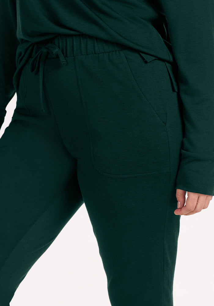 Deep Pine Woolx Mary Kate Lounge Pants in moisture-wicking Merino wool with an elastic drawstring waist and side pockets.