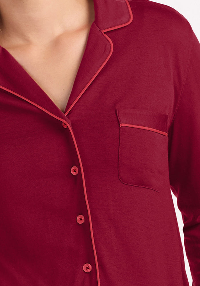 Deep red Woolx Harper FeatherTouch® Pajama Set top with a button-down front, collar, chest pocket, and thin piping trim.