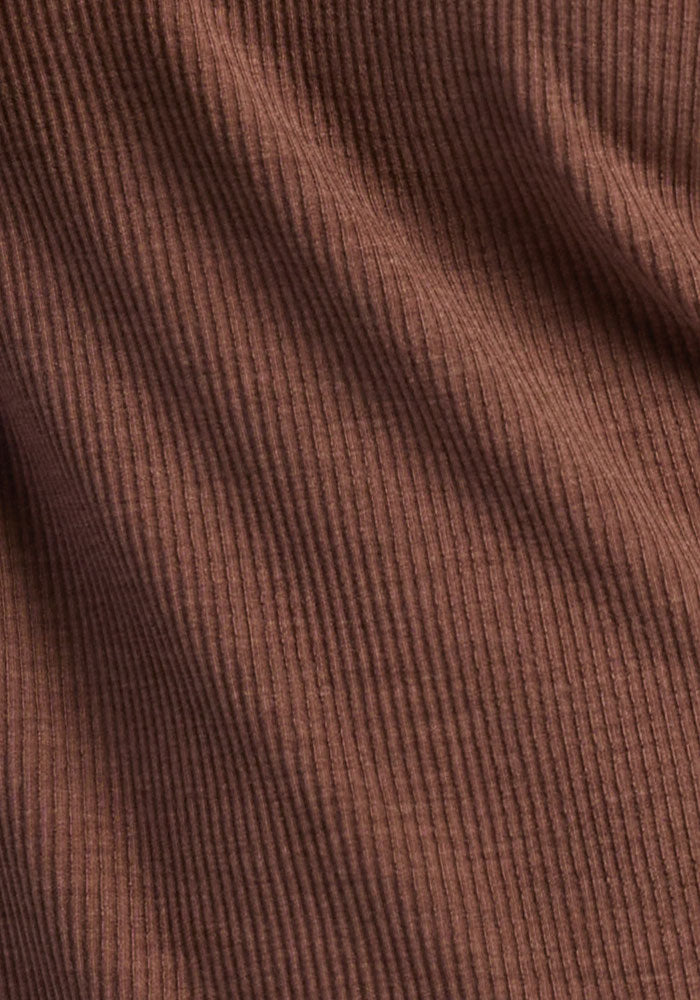 Close-up of Woolx Lennon Ribbed Joggers in Sable Heather, highlighting the soft, textured fabric and cozy ribbed details.